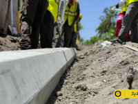 Installation of curbstone is well underway in N. Velidhoo Ocean road